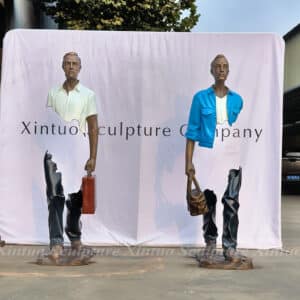 Man with Suitcase Sculpture